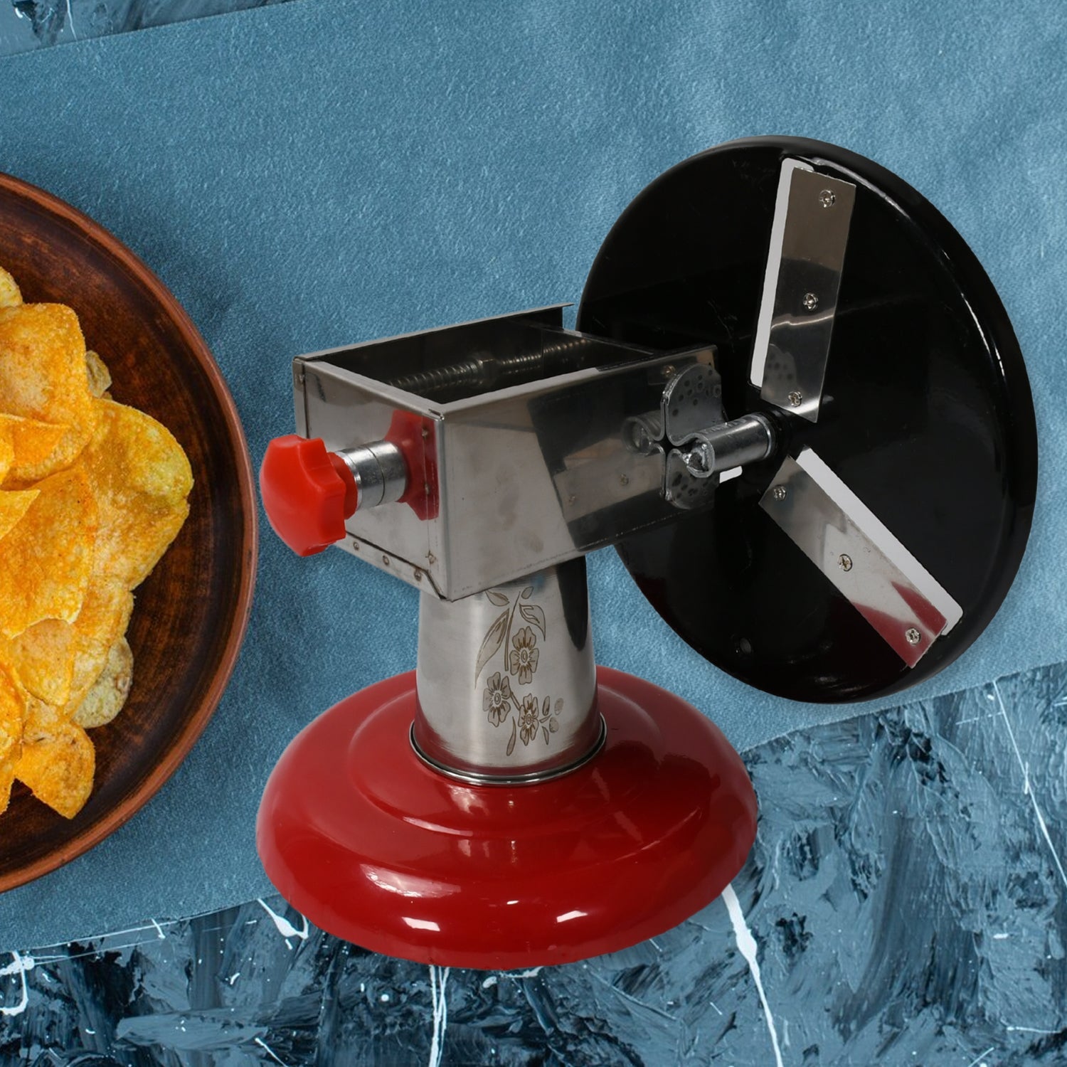 Stainless Steel Chips Maker and Vegetable Slicer for Kitchen Potato Slicer Graters and Chippers. Chips Maker is Suitable for Vegetable Cuttings. Chips Maker Consist Hard Coated Iron Wheel and Stand. Stainless Steel Chips Maker and Vegetable Slicer for Kitchen Potato Slicer Graters and Chippers. Chips Maker is Suitable for Vegetable Cuttings. Chips Maker Consist Hard Coated Iron Wheel and Stand.
